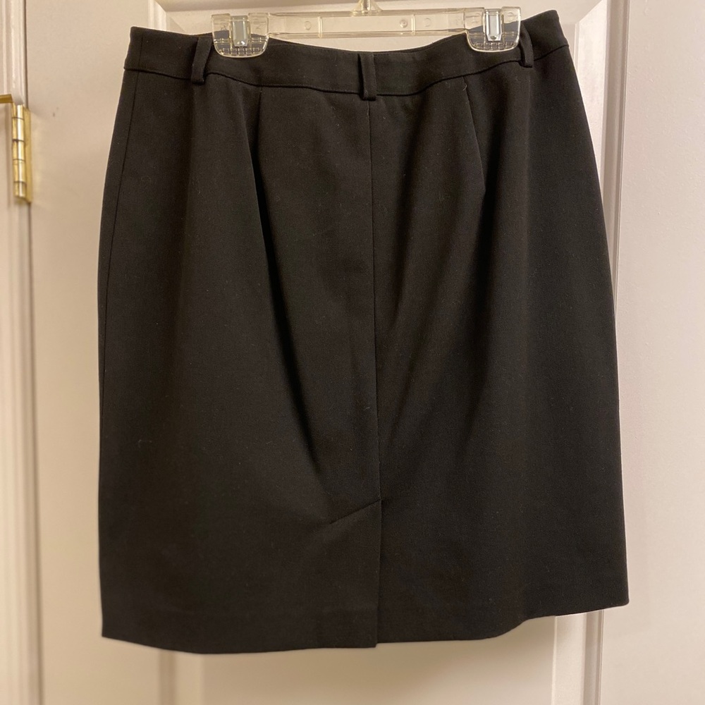 Talbots black pencil skirt w/stretch. Size 8P. Pant like button/zip fly closure.